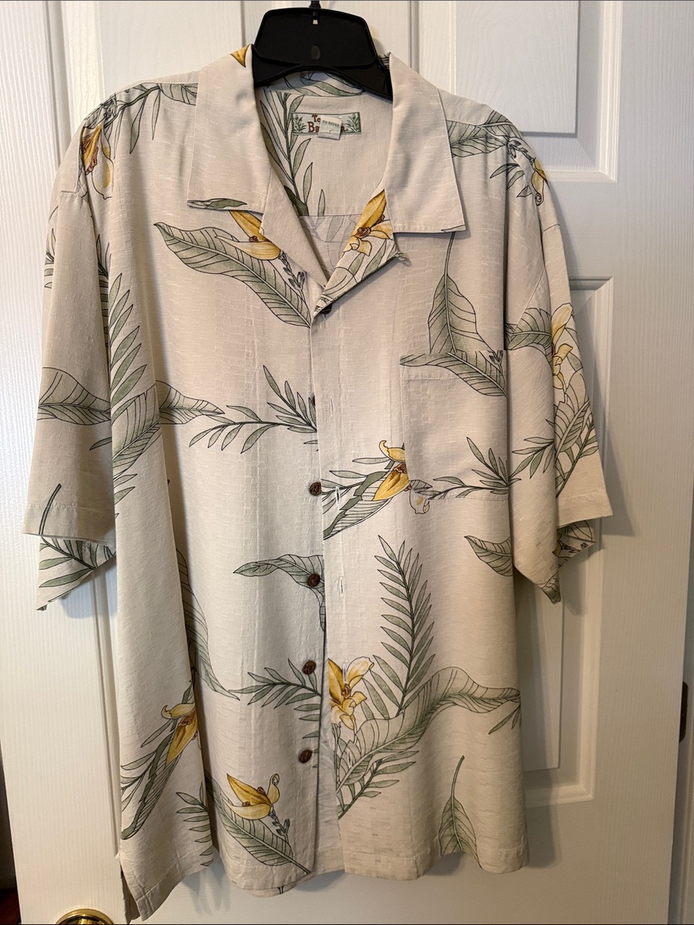 Tommy Bahama Beige Floral Camp Shirt with Yellow Flowers and Green Leaves